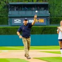 Man throwing pitch next to Detroit Tigers mascot pt. 3